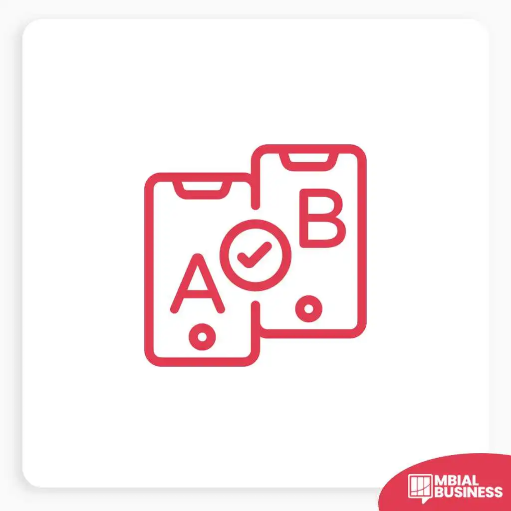 A square banner with a white background and rounded corners. In the center is a red line-art icon of two smartphones side by side. One phone is labeled "A" and the other "B." A red checkmark inside a circle is positioned between and slightly over the phones. A red "MBIAL BUSINESS" logo is in the bottom right corner.