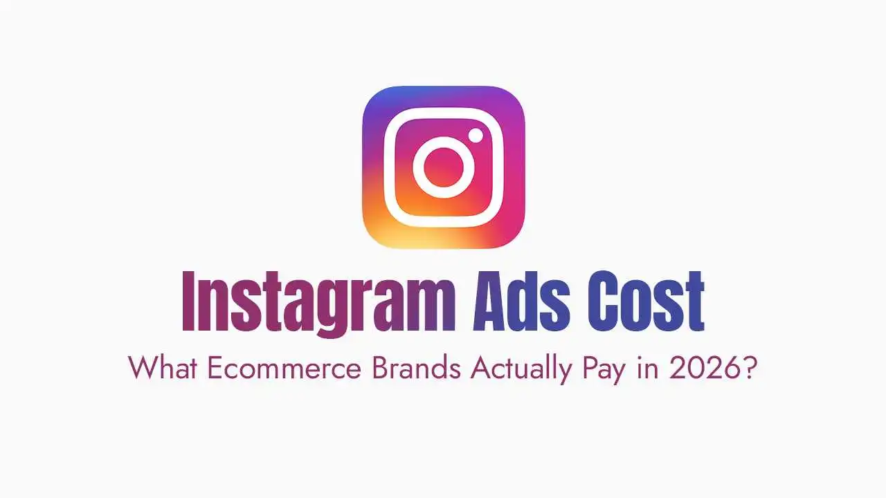 The image features the official vibrant gradient instagram logo positioned centrally at the top against a clean white background. Below the icon, large bold text in a purple-to-blue gradient reads "Instagram Ads Cost," followed by a secondary line of smaller maroon text asking "What Ecommerce Brands Actually Pay in 2026?" which suggests a data-driven analysis of social media marketing expenses for online retail businesses in the current year.